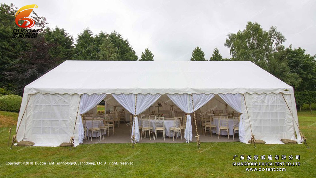 Outdoor marquee tent for banquet with all decoration