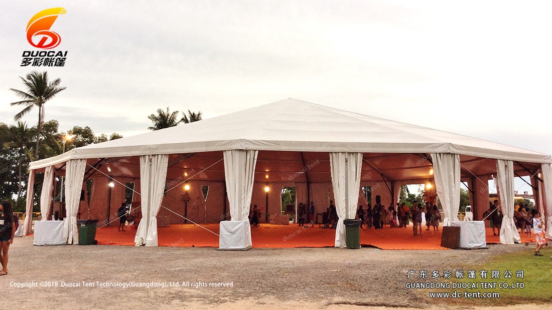 Multi-side tent with a high peak for wedding party