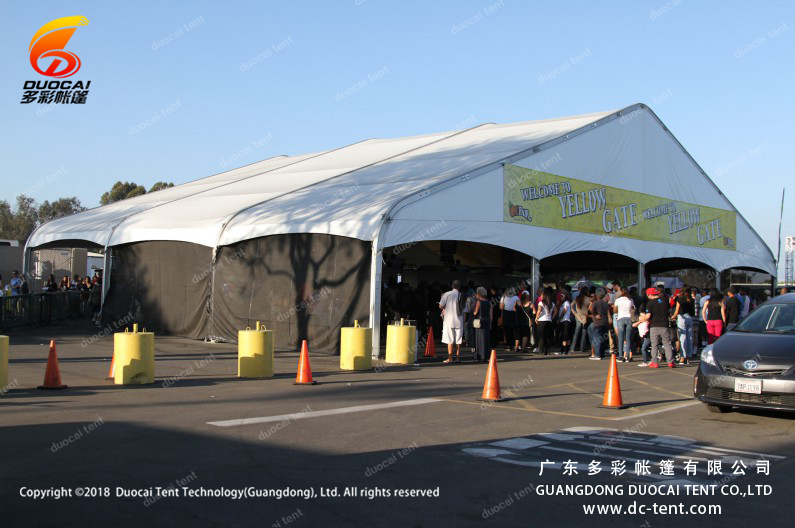 Arcum tent with curved roof design