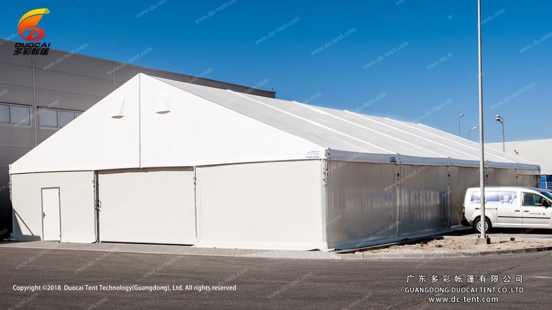 Industrial store tent with ABS wall accessory.