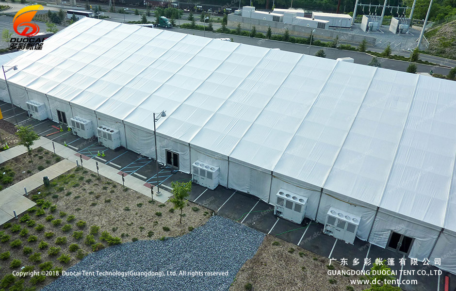 Indoor parking lot made up of large tents