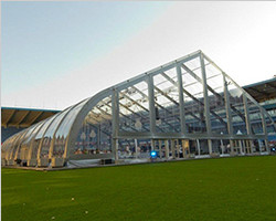 Curved roof tent for indoor sport event