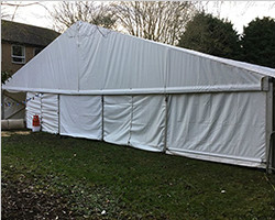 Reception tent for speech venue with flooring